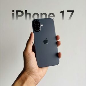 A hand holding a dark gray iPhone concept with vertical dual cameras and "iPhone 17" text.