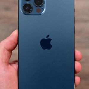 A hand holding a Pacific Blue iPhone showing the triple-camera system.